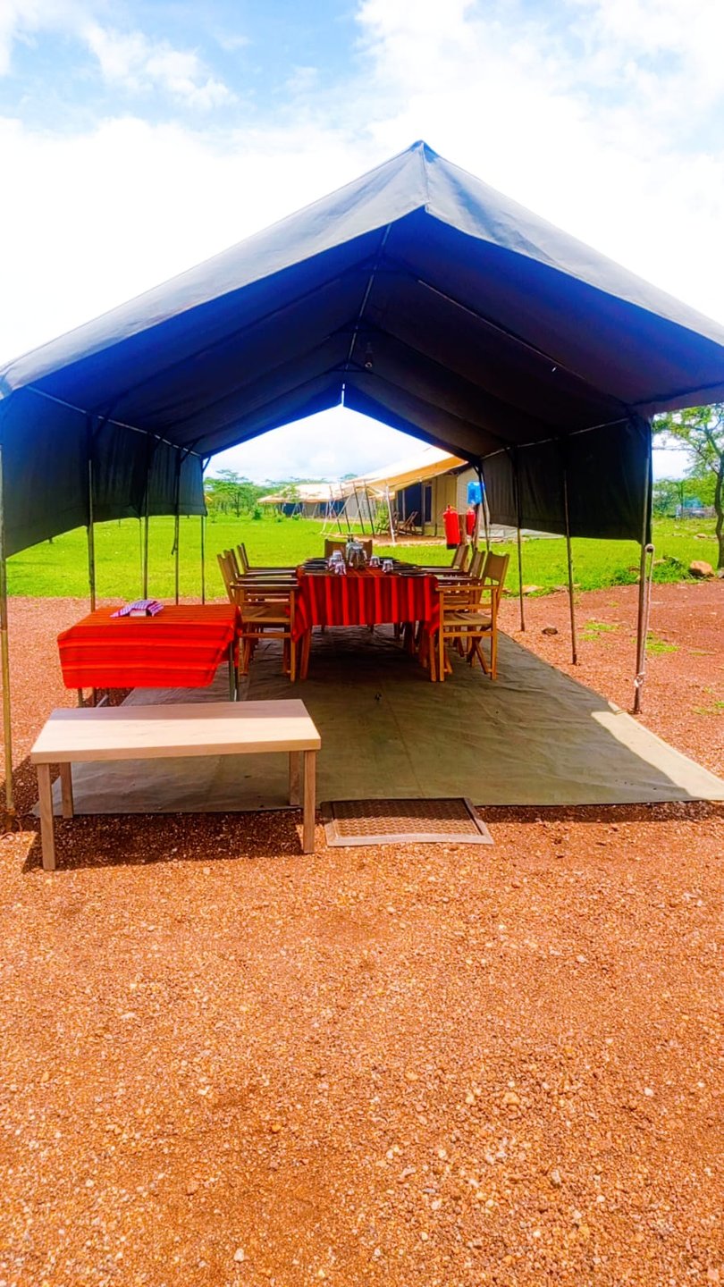 Mess tent dining setup at camp