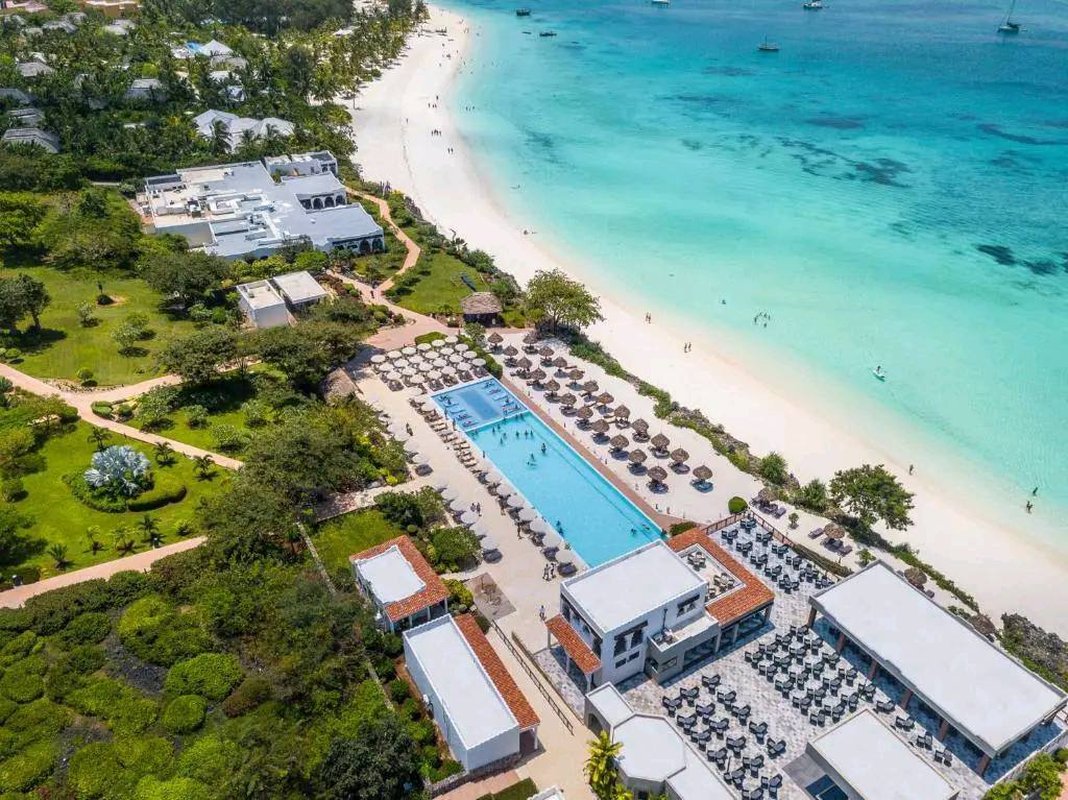 Aerial view over the pool deck and beach