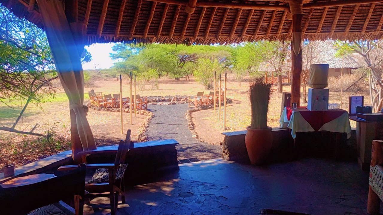 Bar and dining area with views over the camp